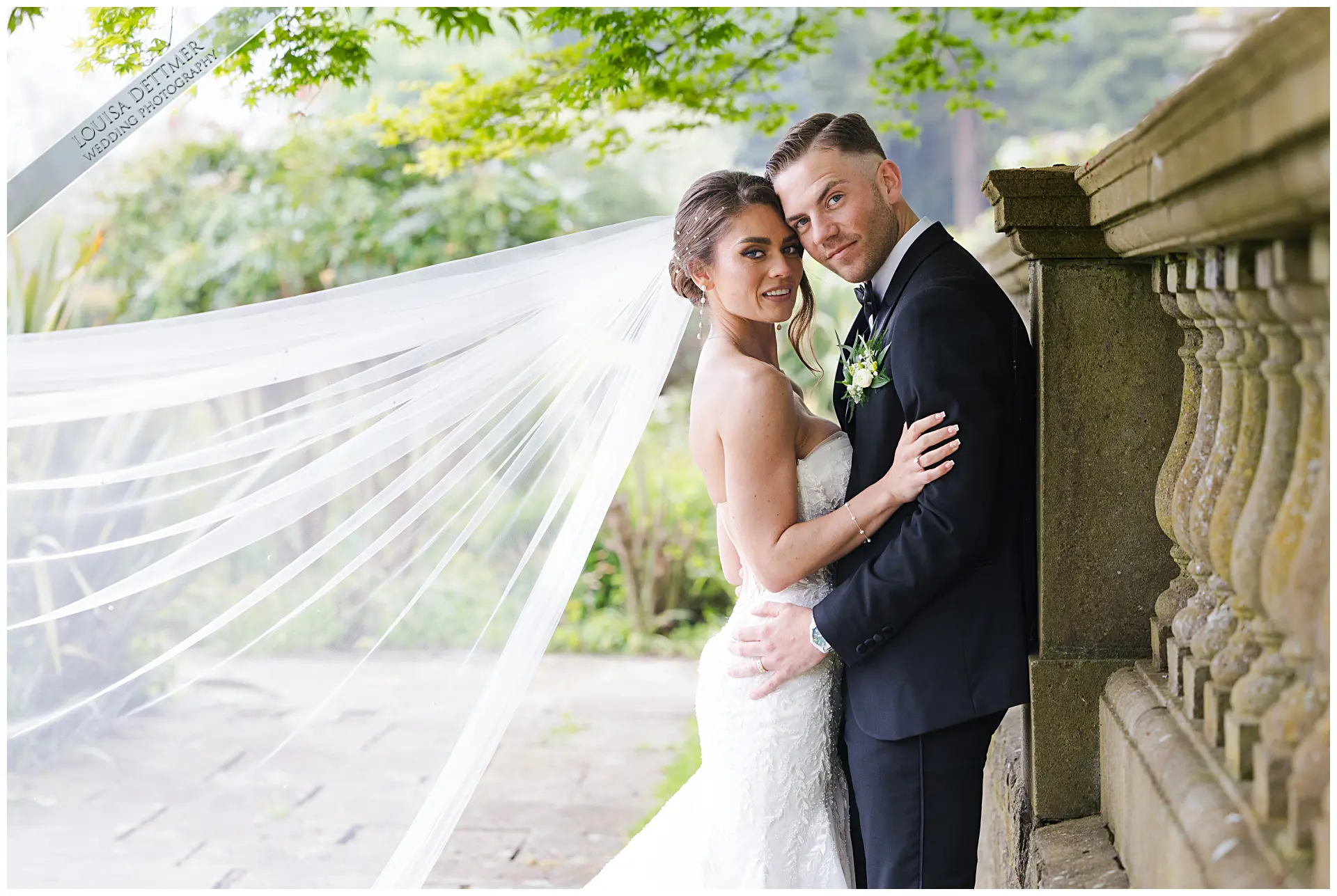 bride and groom in the italian gardens at Eastwell manor