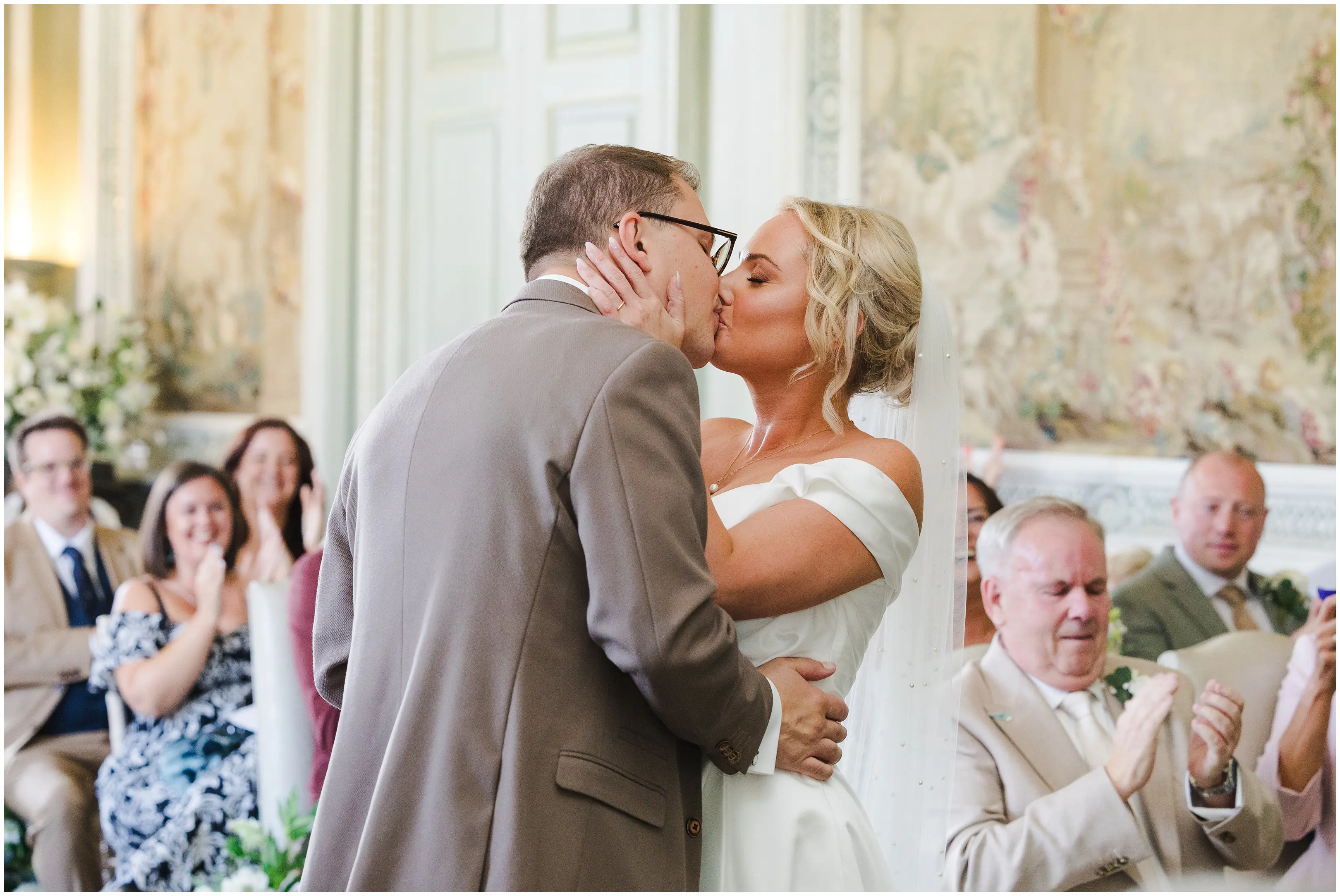 bride and groom share a kiss leeds castle, louisa dettmer photography