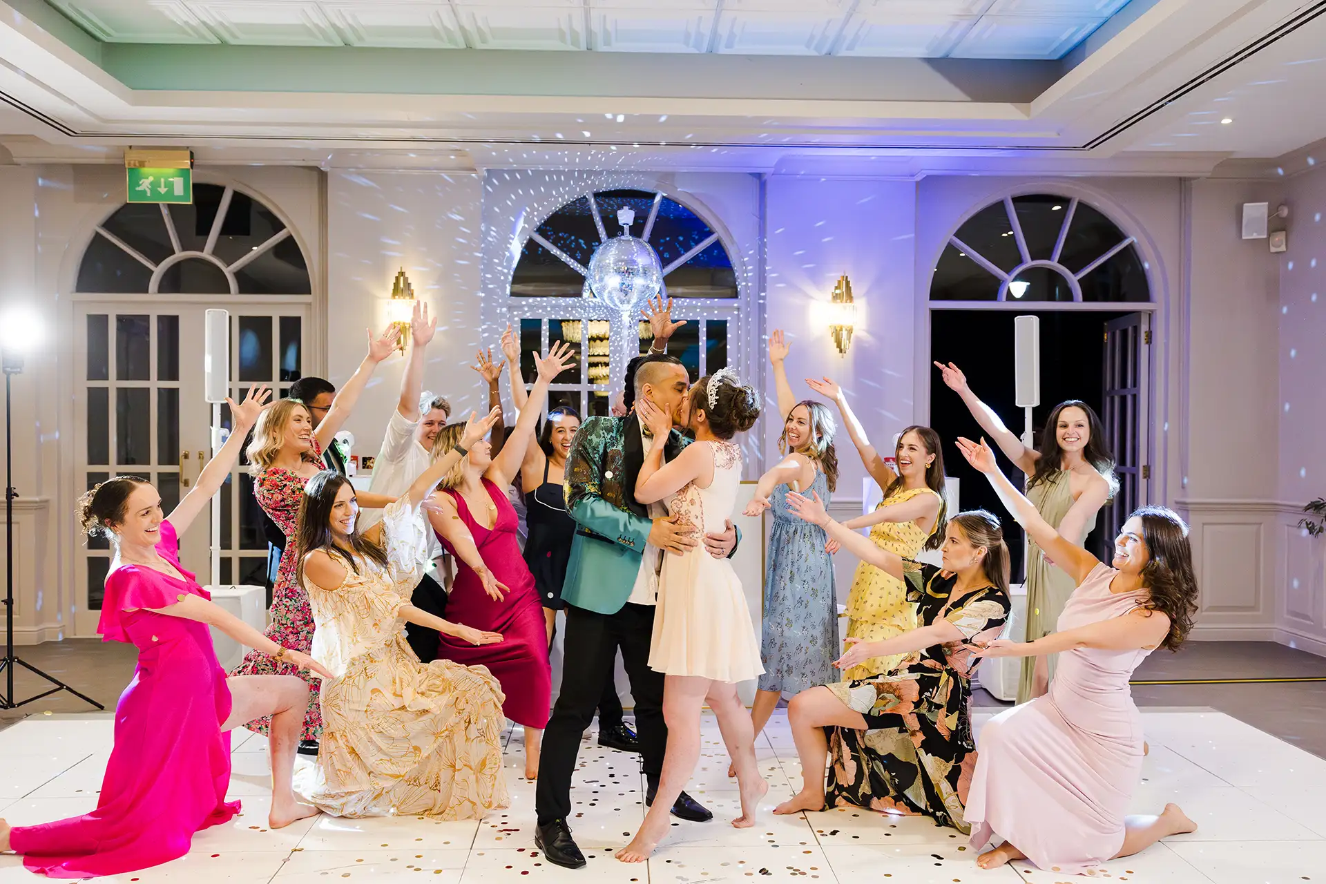 bride and groom kiss celebration louisa dettmer wedding photography