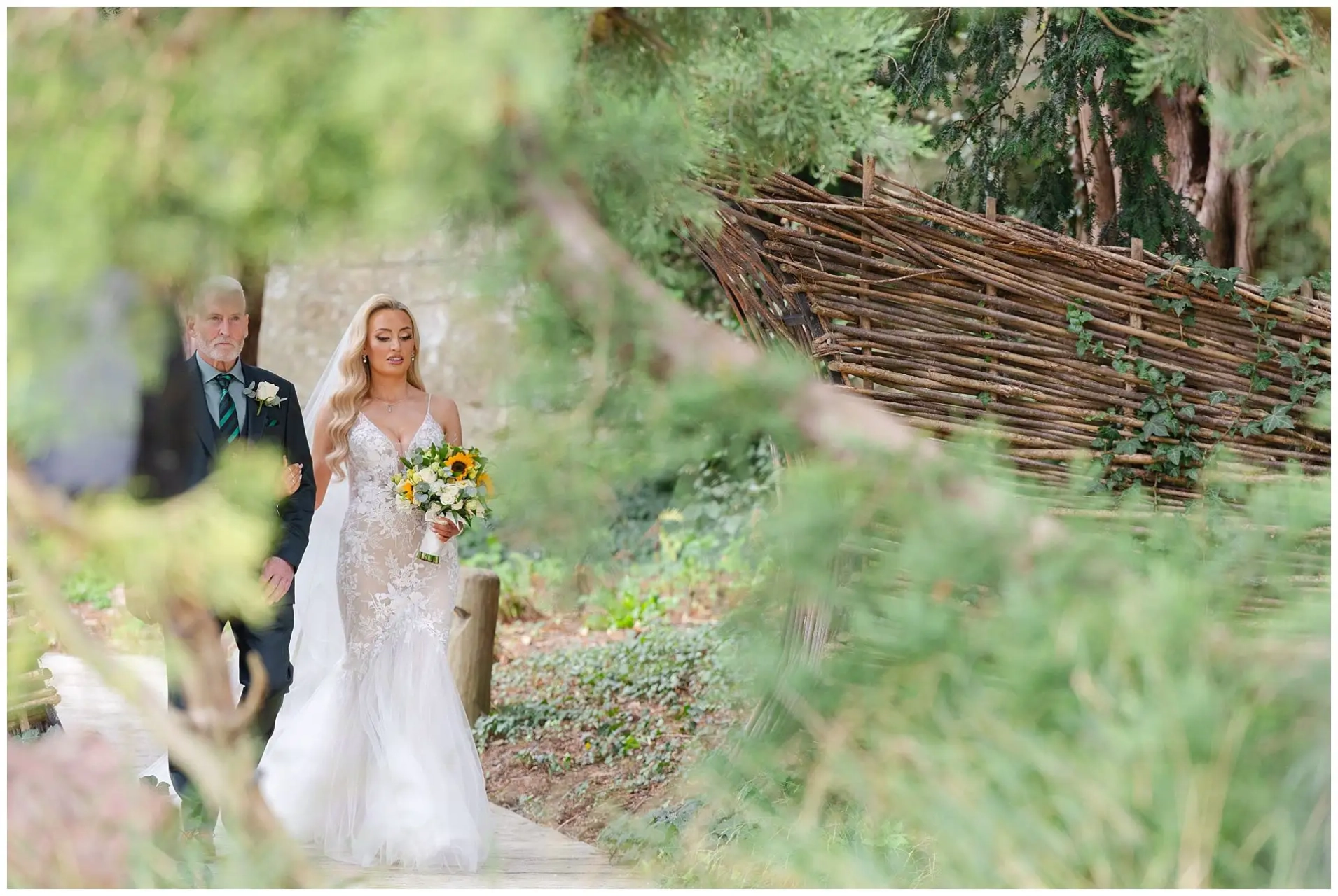 bride walking with father wedding ceremony at the Orangery Maidstone by Louisa Dettmer Photography