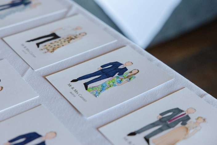 illustrated wedding couple cards Custom illustrated wedding place cards featuring personalized couple fashion sketches for table seating decor.